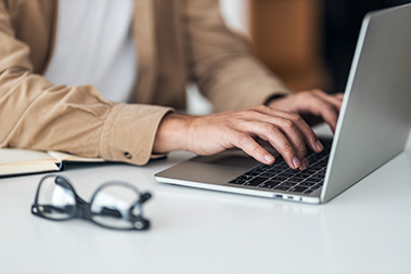 hands-typing-on-computer-glasses.jpg