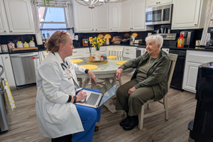 Sentara Nurse Practitioner Amanda Coyle visits Frances Brooks in her home