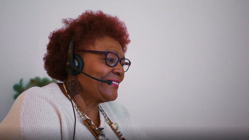 Nurse Advice Line talking on headset