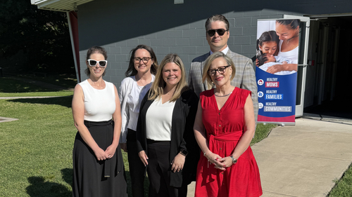 Lavinia Smith and Sentara team members at the opening of a new housing and treatment program for mothers with substance abuse issues