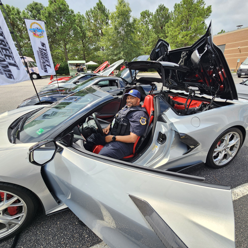 Martrice Chaviest, security officer at Sentara Princess Anne Hospital, checks out the corvettes before getting a prostate cancer screening.