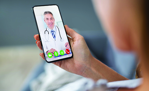 Man taking a telehealth appointment