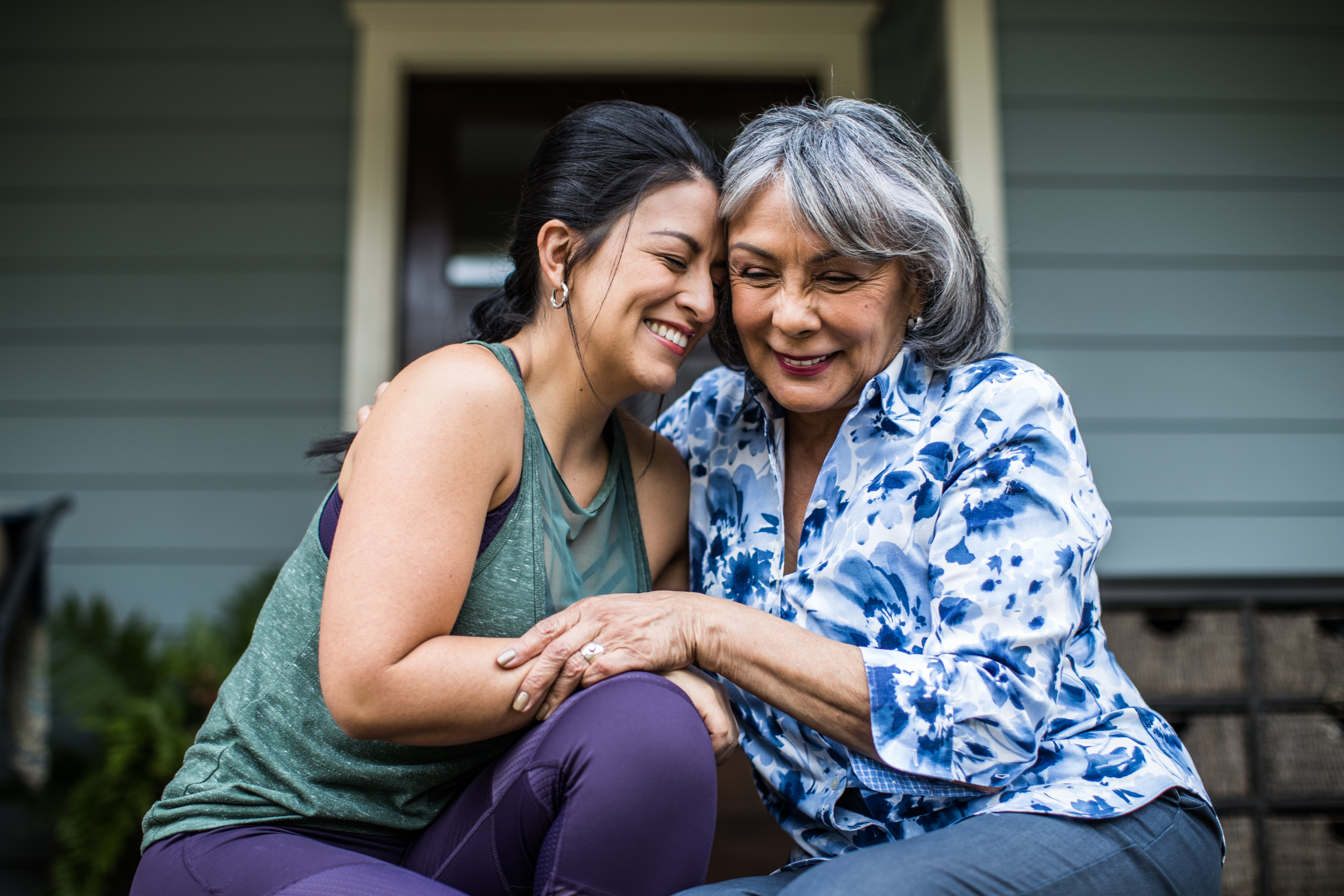 mother and daughter embracing