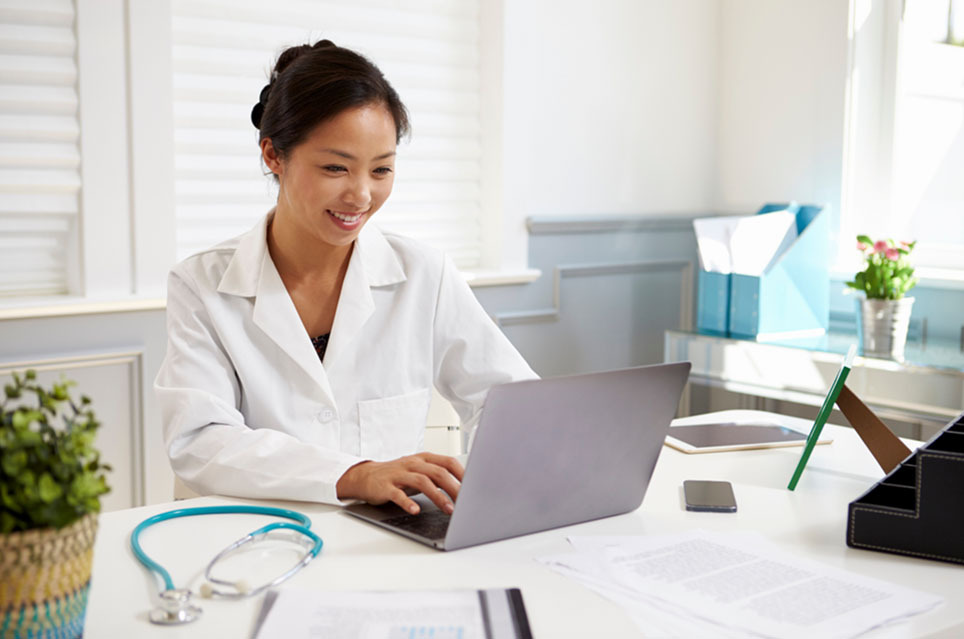 clinical provider working on computer