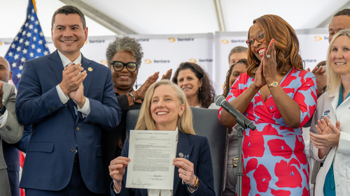 Virginia Gov. Abigail Spanberger poses with a group of Sentara leaders and local politicians at the ceremonial signing of the Protecting Healthcare Workers Act at Sentara Norfolk General Hospital, Thursday, June 4, 2026.