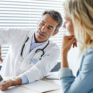 Doctor explaining to patient