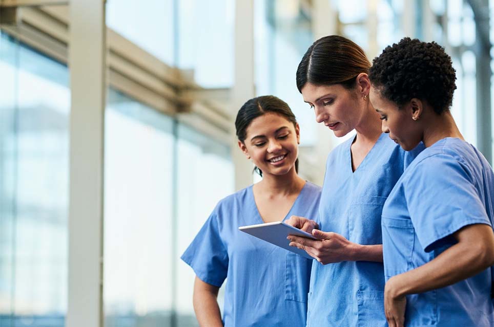 3-nurses-looking-at-tablet.jpg