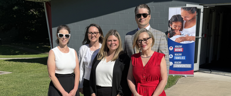 Lavinia Smith and Sentara team members at the opening of a new housing and treatment program for mothers with substance abuse issues