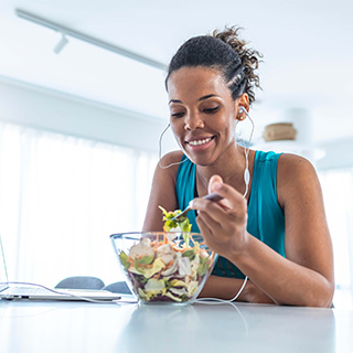 woman eating salad