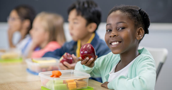 banner-girl-with-apple-outreach-sm.jpg