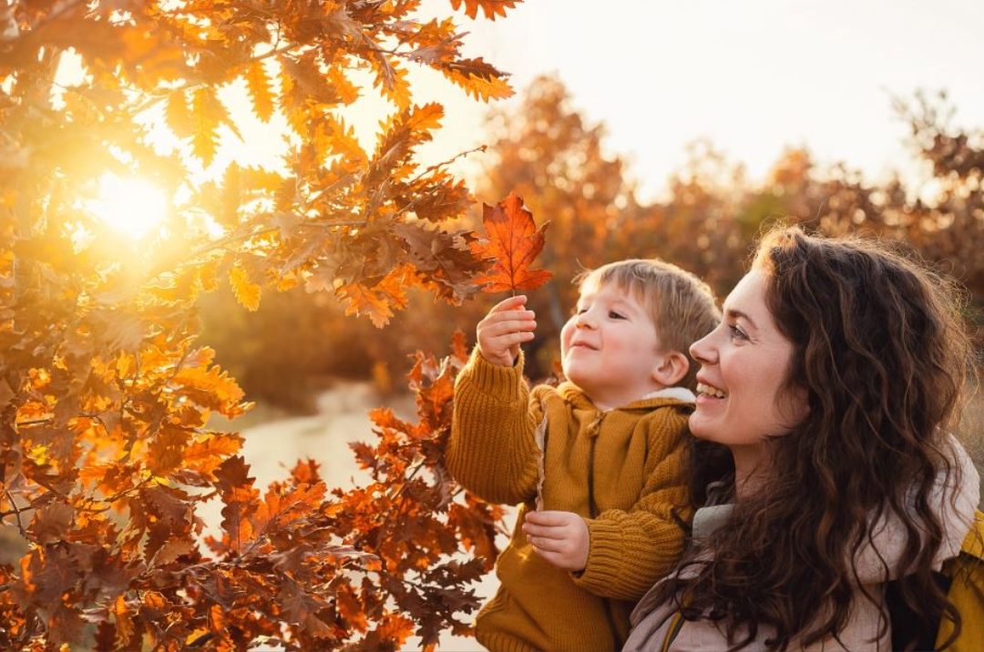 mom-and-son-autumn-leaves.jpg