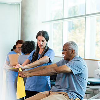 physical therapist and patient