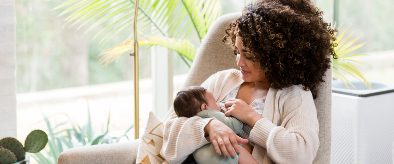 mom breastfeeding baby