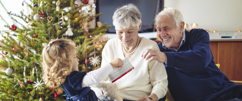 grandparents and granddaughter on Christmas