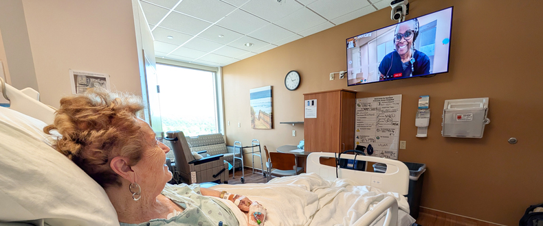 Patient Laura Bruno talks with virtual nurse Shinette Dunn at Sentara Princess Anne Hospital.jpg