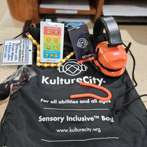 A sensory inclusion bag at Sentara includes noise-reducing headphones, fidget tools, visual cue cards, and weighted lap pads.