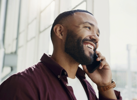 man-on-phone-smiling-promo-card.jpg