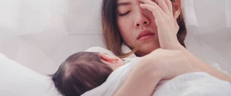 mother-holding-baby-and-face.jpg