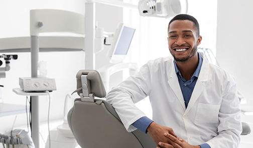 smiling-male-dentist-card.jpg