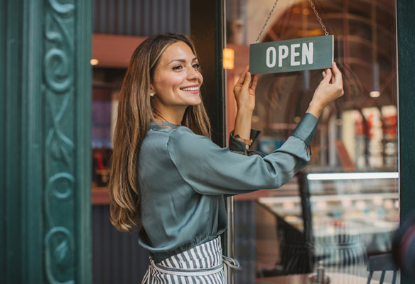 Woman at opening sign