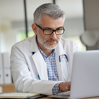 provider working on computer