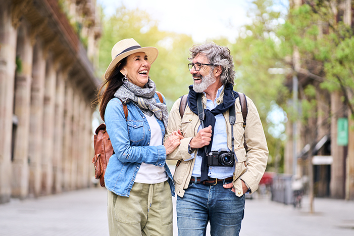 Smiling tourists walking 