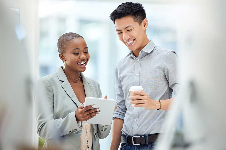 Woman and man looking at a document together