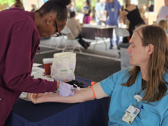 Matt Smith, radiology technologist at Sentara Princess Anne Hospital, undergoes a PSA blood test during an employee prostate cancer screening event at the hospital.