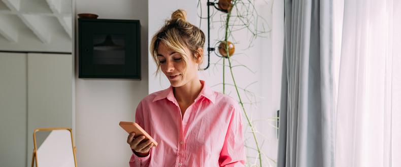 woman looking at phone