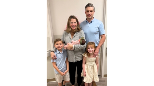 Stephanie family poses after birth.jpg