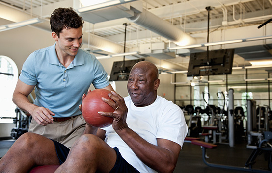 Individual receiving physical therapy from a professional.