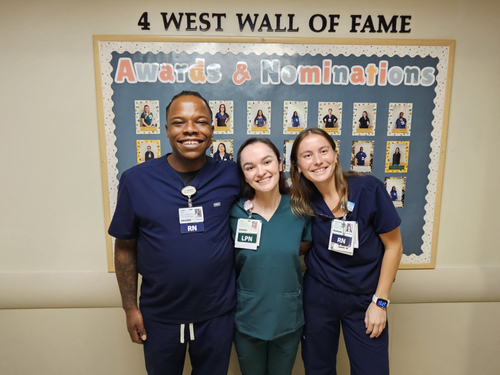 Scott stands with Alexandra Schultz (middle), licensed practice nurse, and Caroline Verhappen, registered nurse, who also completed Sentara’s patient care technician program.