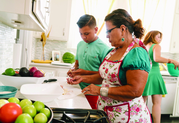 Family prepares a balanced meal to support healthy blood sugar management