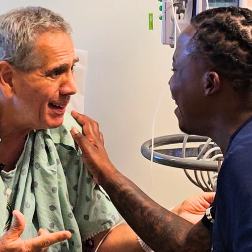 Patient Benny Brocato (left) and his nurse, Willie Scott, enjoy conversation at Sentara Virginia Beach General Hospital. 