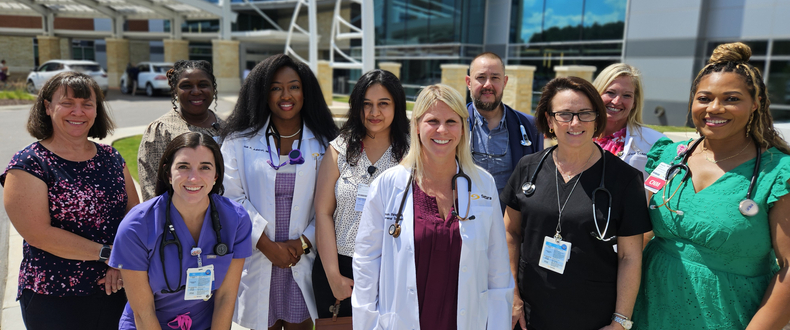 Ten providers stand in front of Sentara Albemarle Medical Center.
