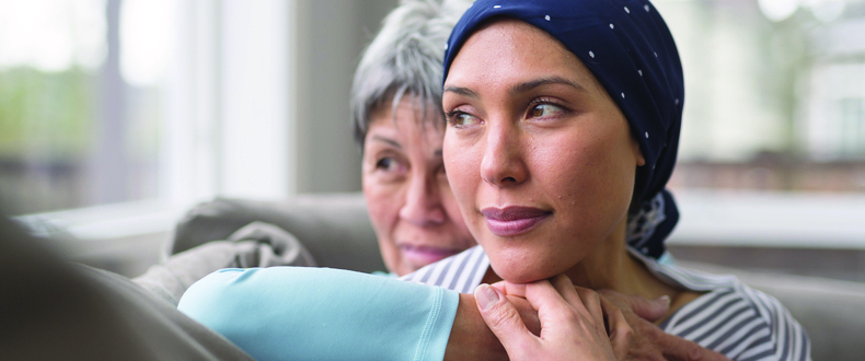 Woman With Cancer With Family Member