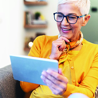 Woman Looking at her Tablet