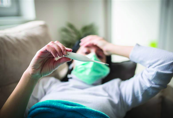 unwell-individual-with-thermomter.jfif