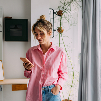 woman looking at phone