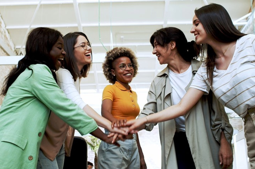 five-women-hands-in-center.jpg