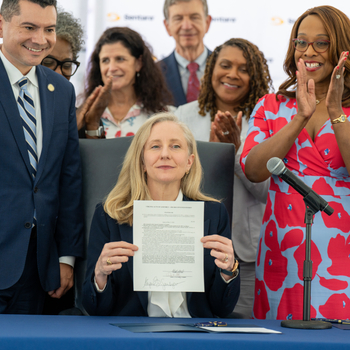 Virginia Gov. Abigail Spanberger poses with a group of Sentara leaders and local politicians at the ceremonial signing of the Protecting Healthcare Workers Act at Sentara Norfolk General Hospital, Thursday, June 4, 2026.
