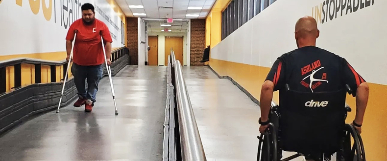 GRACY participants take part in a wheelchair obstacle course.jpg