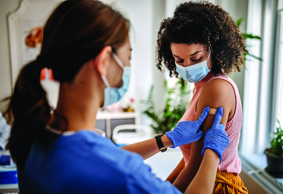 woman getting a COVID vaccine