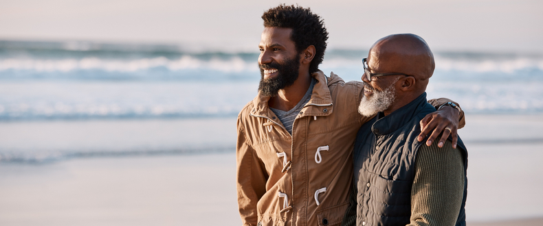 father and son on beach