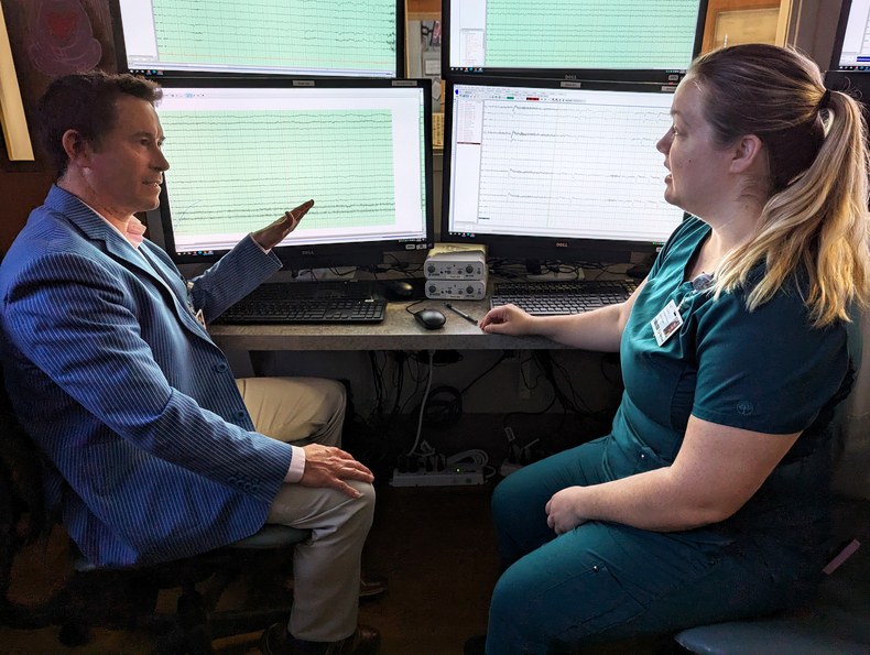 Neurologist Daniel Graf talks with a technician at Sentara Epilepsy Center.jpg
