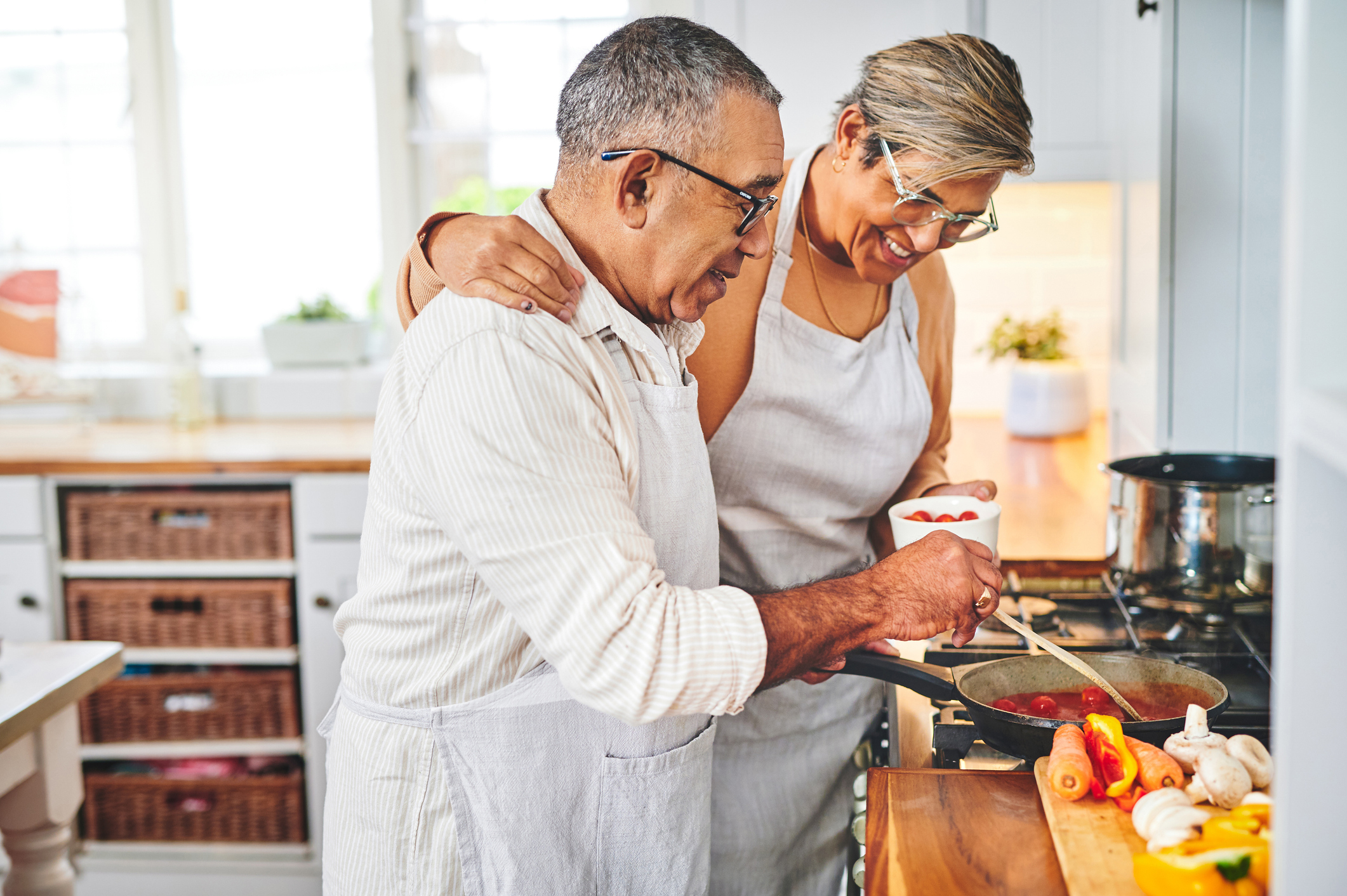 senior couple cooking