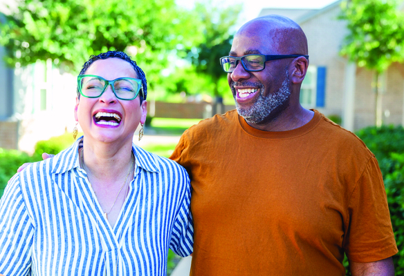 middle aged couple laughing