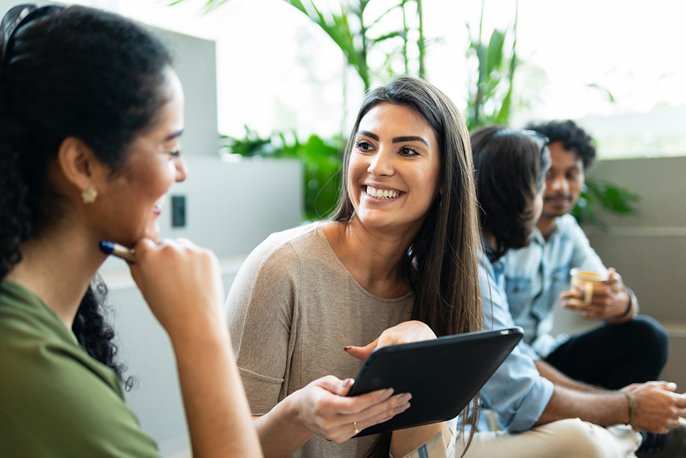 woman-holding-tablet-smiling.jpg